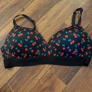 Victoria’s Secret pink bra. Black with cherries.